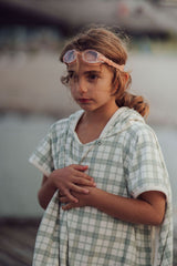 Grech & Co organic cotton towel poncho in fern green is the perfect blend of comfort. The retro-inspired hooded beach poncho for kids, shop kids beach clothing.