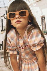 Puffed sleeve dress for girls with ruffle skirt makes a perfect girl summer dress. Making it perfect for kids summer clothing collection. Best girl dresses.