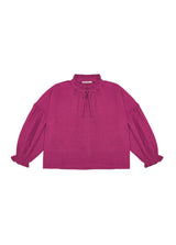Pink sustainable girls blouse is stylish and comfortable. It is made with organic cotton chiffon with a tie-dye print in burgundy colour for trendy girls.