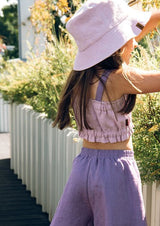 Shop sustainable and breathable girl's stylish linen crop top, a trendy crop top for girls in lilac colour with purple straps, will be her favourite crop top this summer. Our collection features trendy crop tops and cool linen tops and kids swimwear. Shop the best kids summer clothing online at MiliMilu.