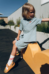 The best summer shirt for boys and tweens. This lightweight summer shirt with embroidery -Chill this summer shirt is extra light. The best kids clothing online.