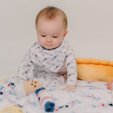 baby sitting on the wee bean minky blanket in white bunny candy