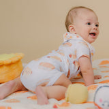 baby turning around tummy time in the wee bean hong kong bakery buns onesie