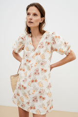 Palermo women linen dress is breathable and lightweight with flower print, short balloon sleeves and pockets. MiliMilu Lifestyle offers women dresses online.