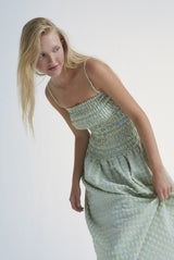 Canyon women summer maxi dress from cotton. The checkeredd women summer dress is designed with straps, pockets, and smock top. The most stylish summer dress.