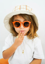Organic cotton kids bucket hats in plaid is reversible bucket. Shop the best baby, kids and teen hats and organic cotton clothing online at MiliMilu Lifestyle.