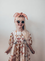 Shop the most adorable sunglasses for girls in pink meadow colour. These environmentally-friendly kid's sunglasses, designed by Grech & Co, are made from non-toxic, shatter-resistant materials, ensuring increased sturdiness, longevity, and adaptability with polarised lenses with UV400 sun protection. Mini-Me available.