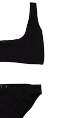 Black bikini set for women, made from recycled fabric with stylish texture online and add to your beachwear capsule wardrobe with timeless black bikini.