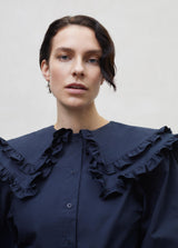 The oversized collar women's blouse is a statement, organic cotton women's blouse is in a stunning dark blue colour with a large collar for treny women online.
