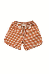  GRECH & CO boys swim trunks in Sienna Gingham are made with sustainable recycled material, providing UPF 50+ sun protection and ultra-comfortable online.
