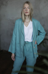 The womens blazer is a loose style jacket in Sea blue, handcrafted from the highest quality European linen. Shop sustainable, slow-fashion womens cothing.