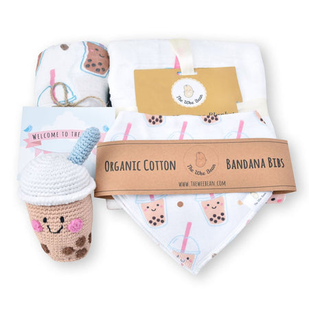 the wee bean organic and sustainable baby gift set in boba with a rattle doll, milestone blanket, swaddle and bib set