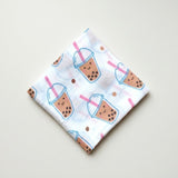 the wee bean organic cotton and bamboo swaddle in boba milk tea