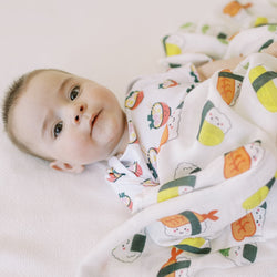 cute baby in sushi swaddle blanket