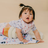 cute baby girl crawling in the wee bean bunny candy organic cotton onesie