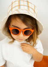 Organic cotton kids bucket hats in plaid is reversible bucket. Shop the best baby, kids and teen hats and organic cotton clothing online at MiliMilu Lifestyle.
