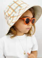 Organic cotton kids bucket hats in plaid is reversible bucket. Shop the best baby, kids and teen hats and organic cotton clothing online at MiliMilu Lifestyle.