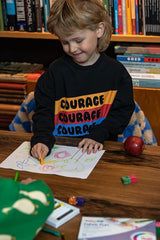 Organic cotton jumper for kids with Courage print.MiliMilu Lifestyle offers sustainable and eco friendly kids clothing. The best gift for kids and tweens.
